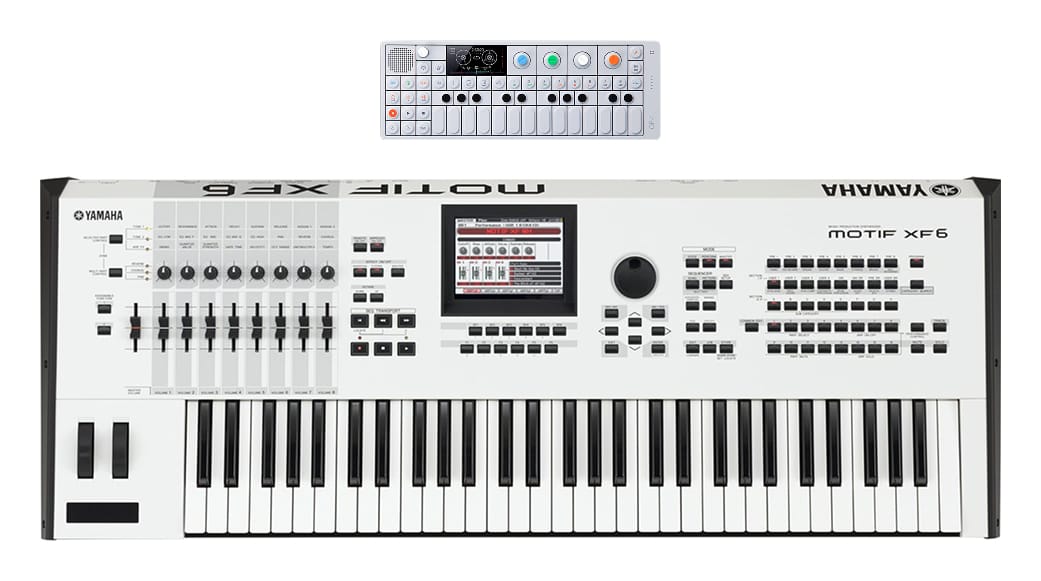 An image of the Teenage Engineering OP-1 instrument next to the much larger Yamaha Motif XF6. The OP-1 is 11.1 inches long while the Motif is 41.25 inches long.